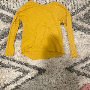 a yellow shirt
